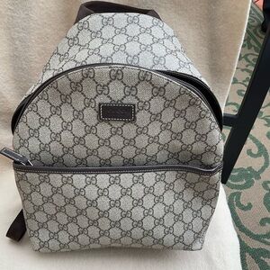 GG canvas leather-trimmed backpack in brown - Gucci Kids Canvas Backpack​​